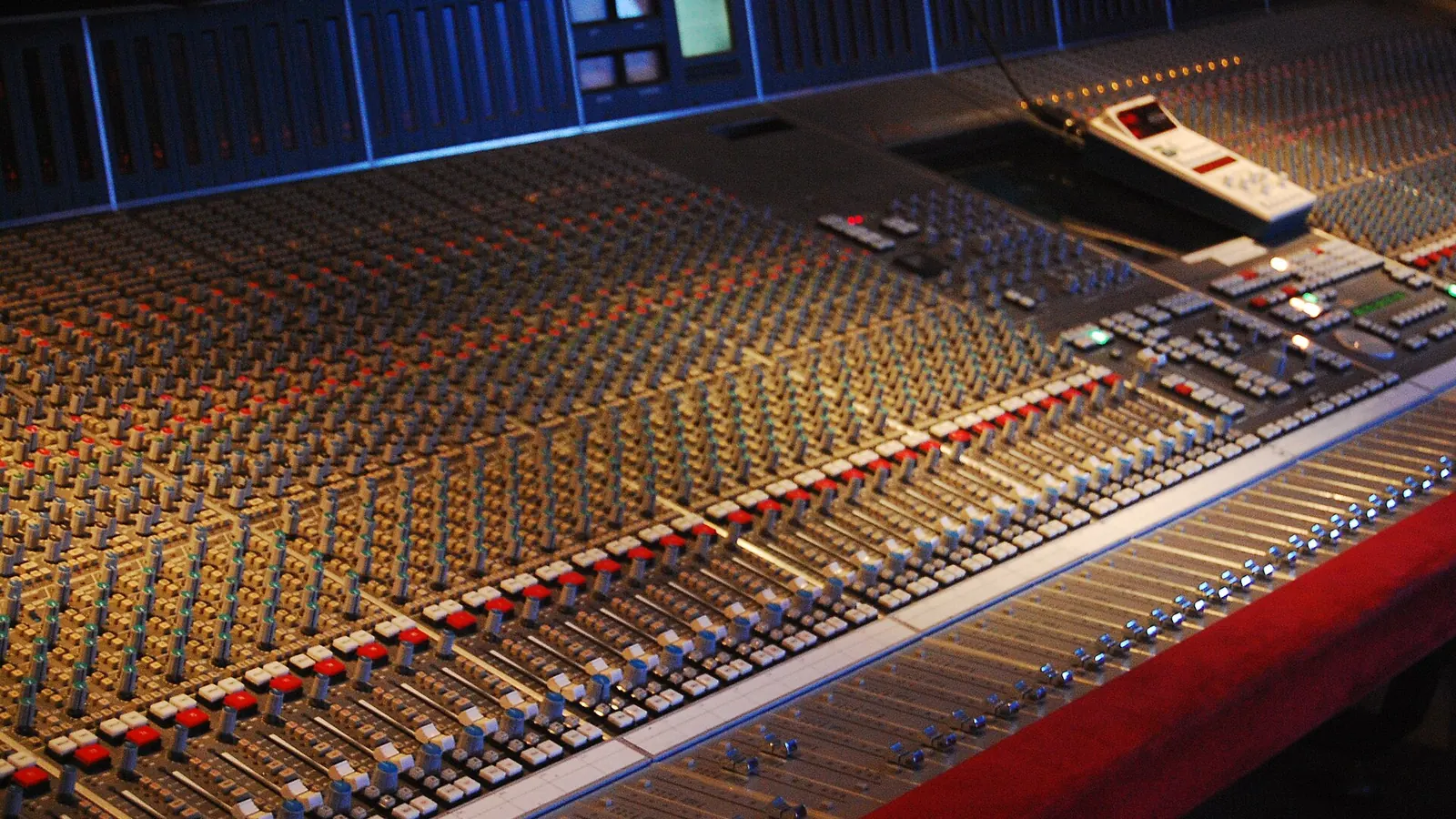 Large mixing console in a recording studio