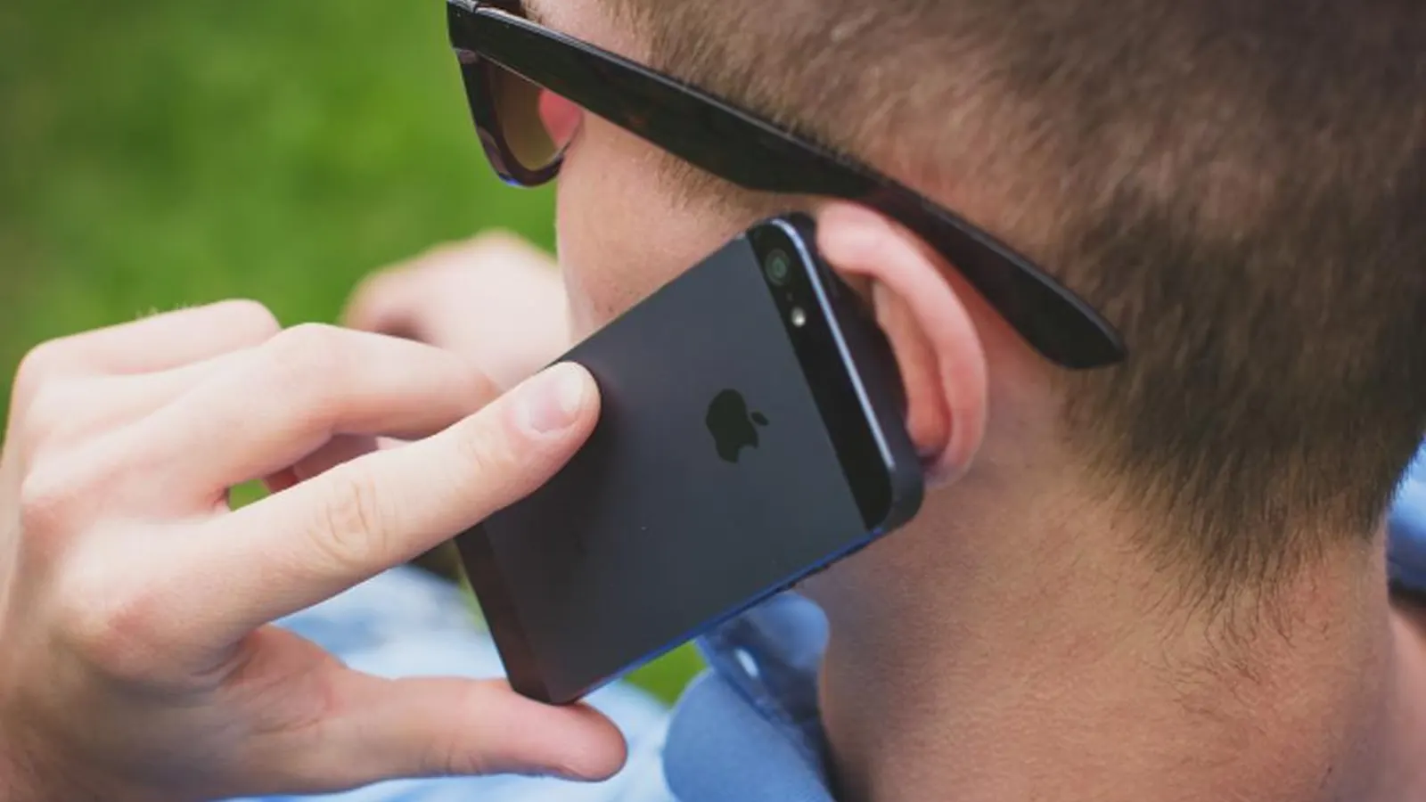 Man holding a smartphone to his ear