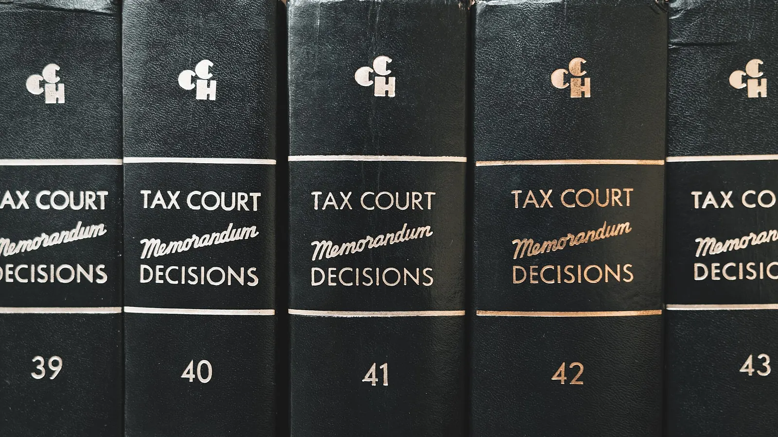 Row of bound legal reference volumes on a shelf